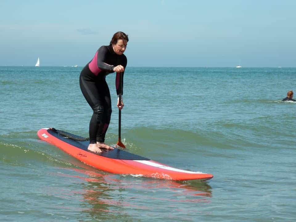 sup surfing on stand up paddle board lessons in bracklesham and devon with surfs sup watersports