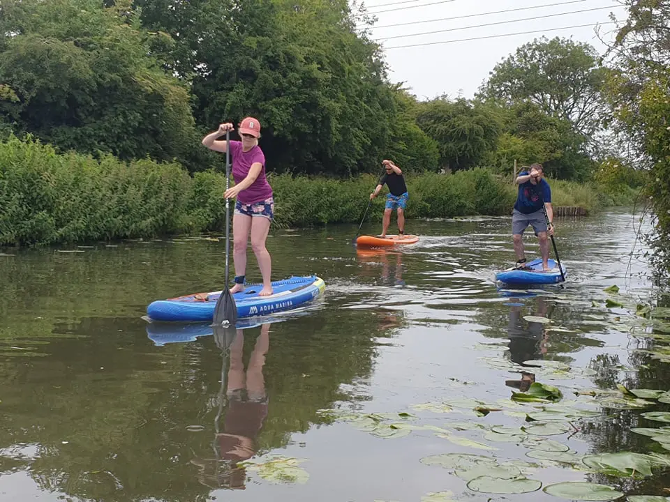 group paddle board lessons on chichester canal