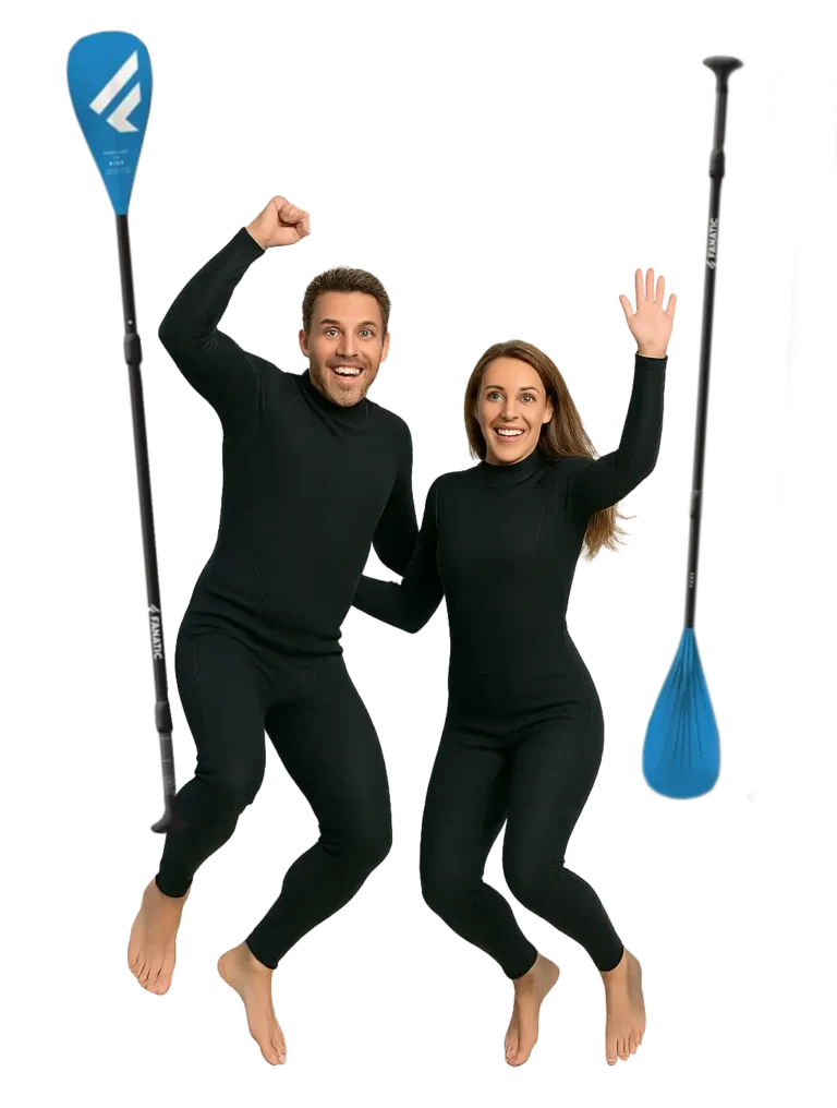 People happy and jumping wearing wetsuits getting ready for the 2025 padleboard season